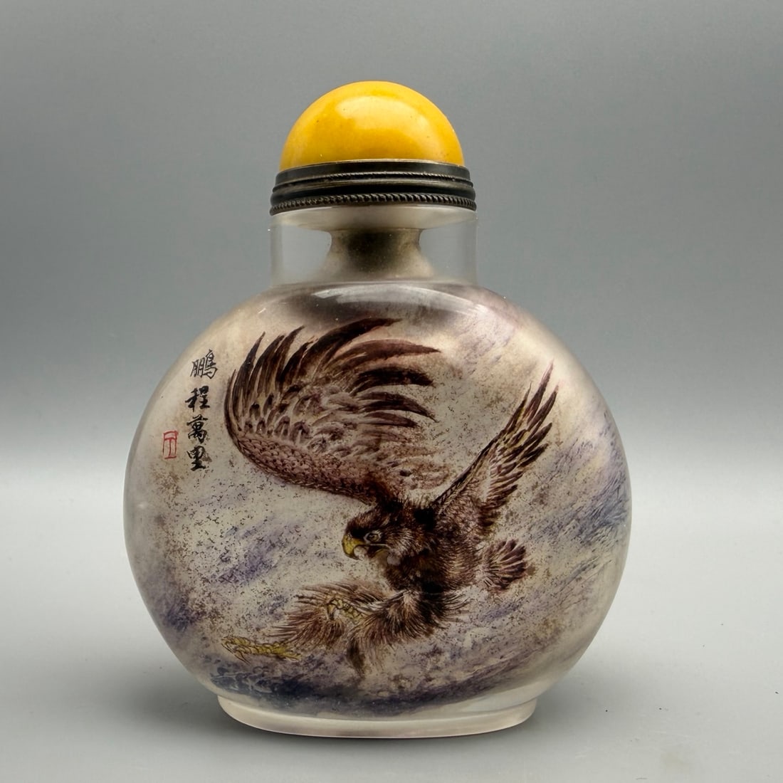 Old Peking Glass Inside Painting Eagle Snuff Bottle: Title: Old Peking Glass Inside Painting Eagle Snuff Bottle Origin: Chinese Date/Period: After1900 Materials: Glass Dimensions: 92x73x36(mm) 3.62x2.87x1.42(inches) Weight 0.36 lbs/165g Reserve: $199.00