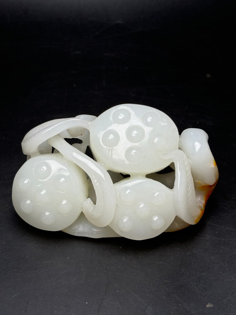 Old Hetian Jade Hand Carved Lotus Pendant: Title: Old Hetian Jade Hand Carved Lotus Pendant Origin: Chinese Date/Period: After1900 Materials: Hetian Jade Dimensions: 78x49x38(mm) 3.07x1.93x1.50(inches) Weight 0.30 lbs/134g Reserve: $1,099.00 S