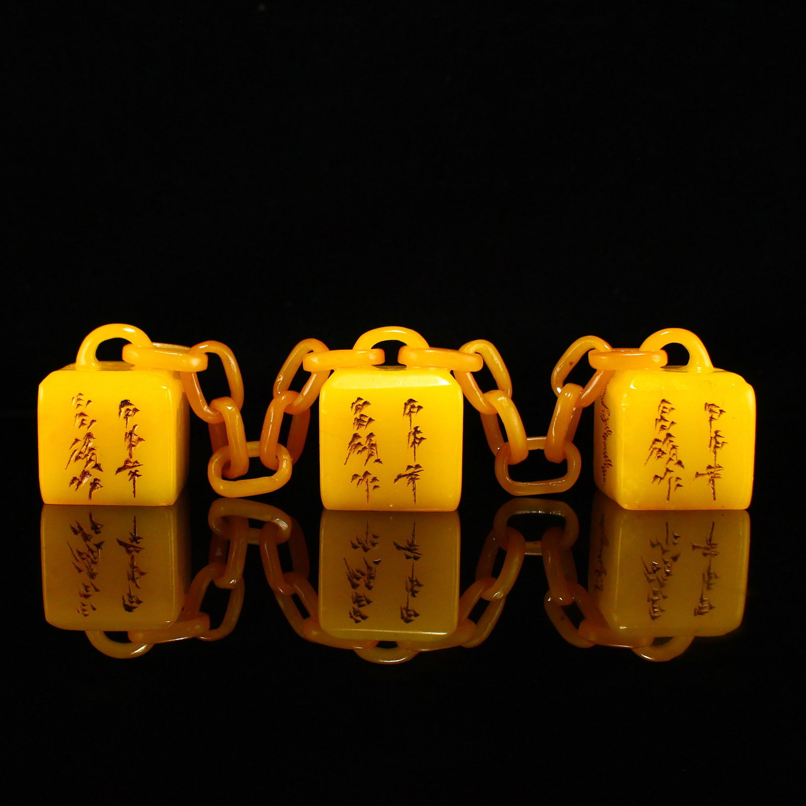 Yellow Shoushan Stone Chain Seal: Title: Yellow Shoushan Stone Chain Seal Origin: Chinese Date/Period: After1920 Materials: Shoushan Stone Dimensions: 34x34x44(mm) 1.34x1.34x1.73(inches) Weight 0.74 lbs/334g Reserve: $199.00 Shipping: