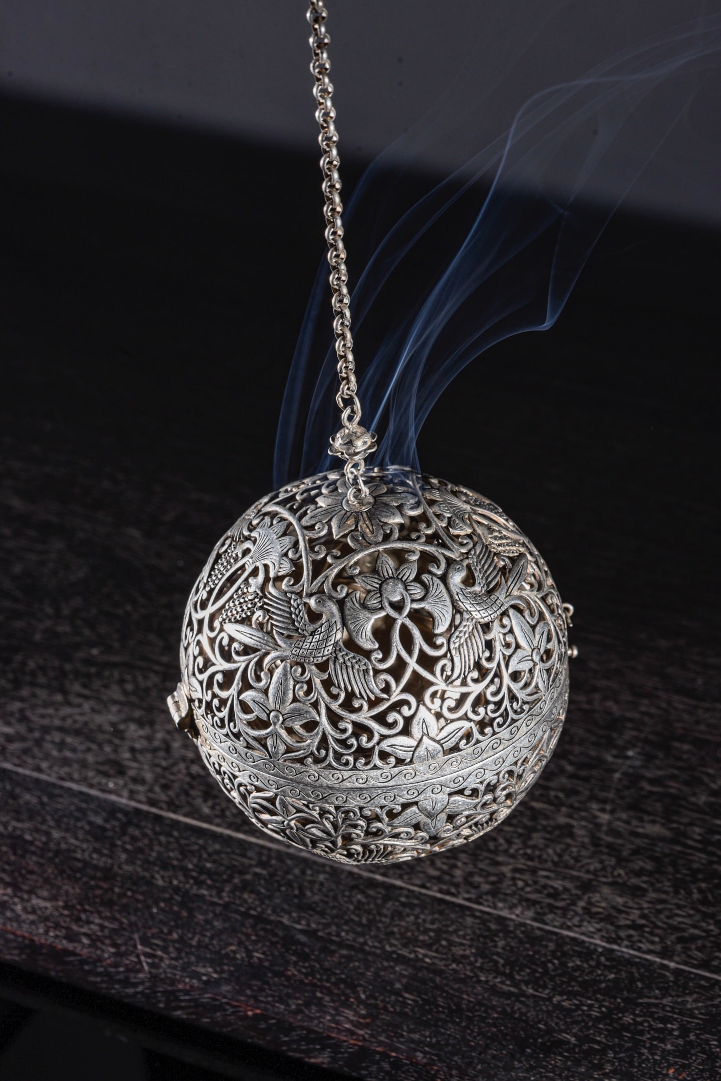 Openwork Pure Silver Flower Bird Incense Burner Ball: Title: Openwork Pure Silver Flower Bird Incense Burner Ball Origin: Chinese Date/Period: After1900 Materials: Silver Dimensions: 100(mm) 3.94(inches) Reserve: $279.00 Shipping: Domestic: Shipping