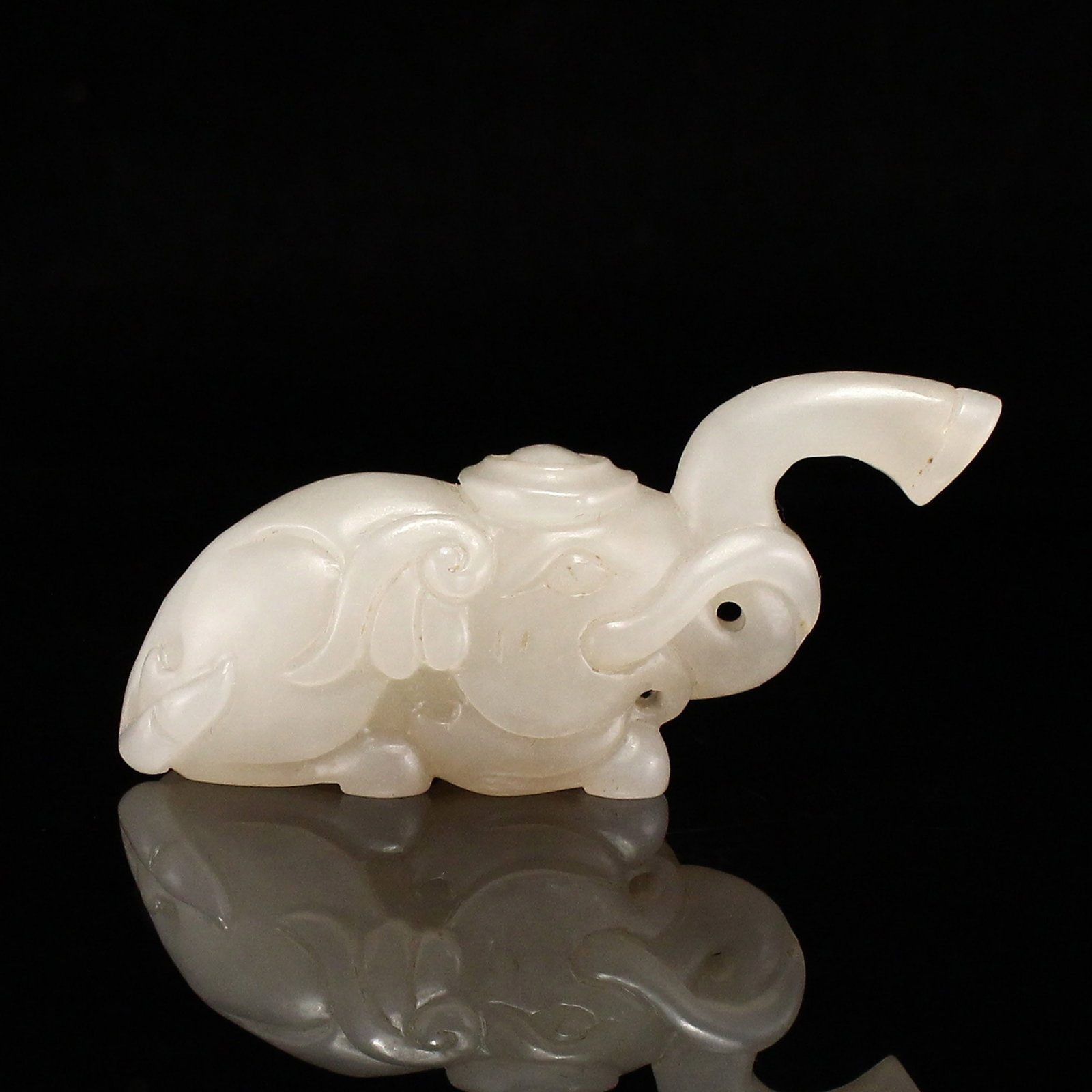Old Hetian Jade Pendant - Elephant: Title: Old Hetian Jade Pendant - Elephant Origin: Chinese Date/Period: After1910 Materials: Hetian Jade Dimensions: 67x20x29(mm) 2.64x0.79x1.14(inches) Weight 0.08 lbs/38g Reserve: $99.00 Shipping: