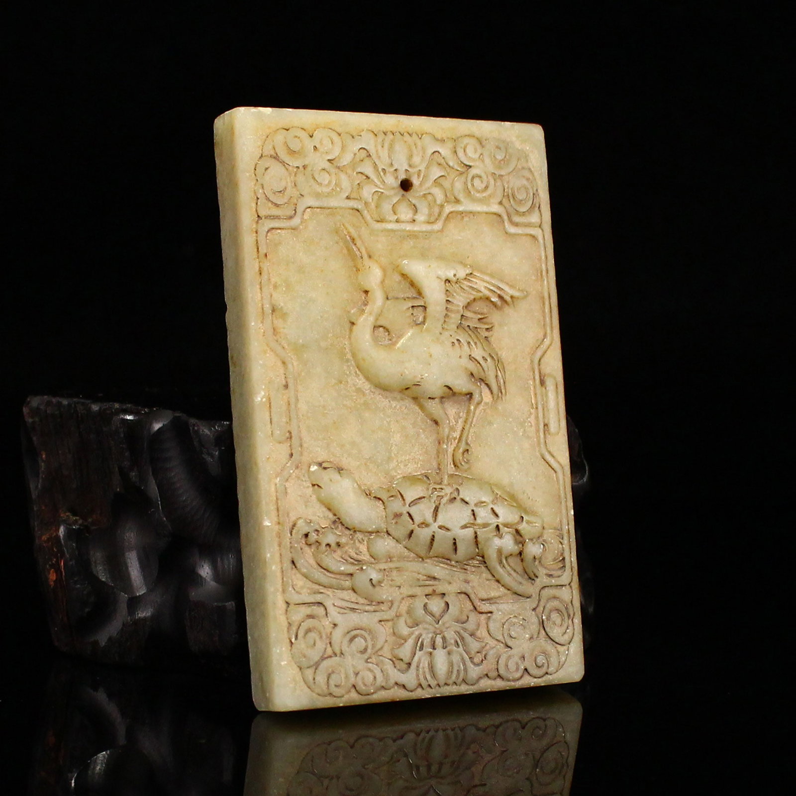 Hetian Jade Pendant - Crane Tortoise: Title: Hetian Jade Pendant - Crane Tortoise Origin: Chinese Date/Period: After1920 Materials: Hetian Jade Dimensions: 65x39x8(mm) 2.56x1.54x0.31(inches) Weight 0.12 lbs/53g Reserve: $60.00 Shipping: D