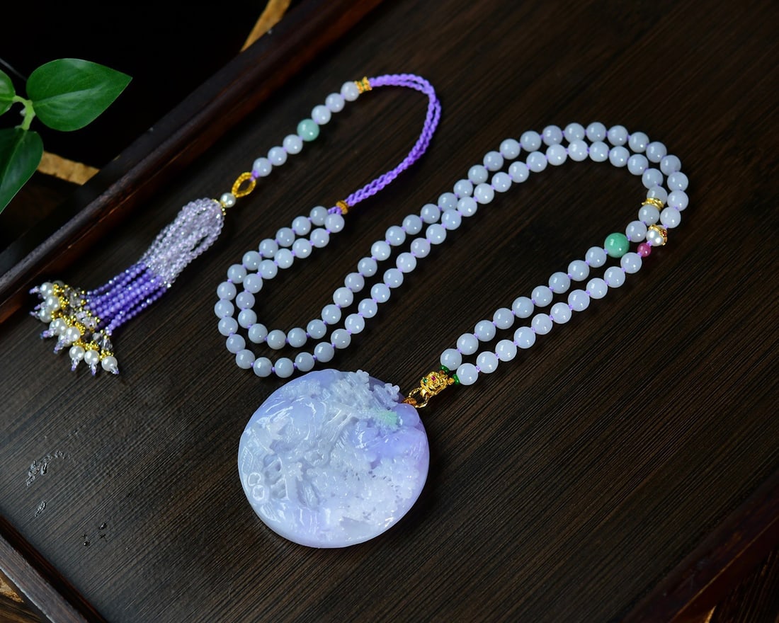 Natural Purple Jadeite Carved Mountain River Scene Pendant with Certificate: Title: Natural Purple Jadeite Carved Mountain River Scene Pendant with Certificate Origin: Chinese Date/Period: After2026 Materials: Jadeite Dimensions: 53x11(mm) 2.09x0.43(inches) Reserve: $1,450.00 