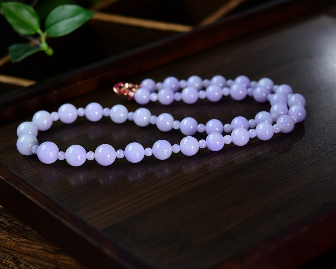 Superb Natural Purple Jadeite Beads Necklace with Certificate: Title: Superb Natural Purple Jadeite Beads Necklace with Certificate Origin: Chinese Date/Period: After2026 Materials: Jadeite Dimensions: 9-12(mm) 0.35-0.47(inches) Reserve: $2,188.00 Shipping: Domes