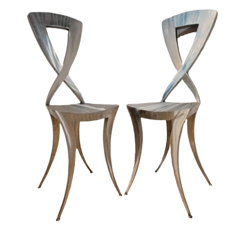 Vintage Italian Modern Sculptural Stainless Steel Silhouette Klismos Style High Chairs - Pair: Title: Vintage Italian Modern Sculptural Stainless Steel Silhouette Klismos Style High Chairs - Pair Description: Vintage Italian Modern Sculptural Stainless Steel Silhouette Klismos Style High
