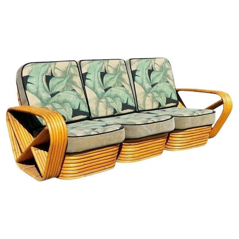 Restored Paul Frankl Style Six-Strand Square Pretzel 3 Seater Sectional Sofa: This beautifully restored Art Deco six-strand rattan square pretzel arm, three-seat sectional sofa. This sofa features the famous six-strand square pretzel side arms and a stacked rattan base original