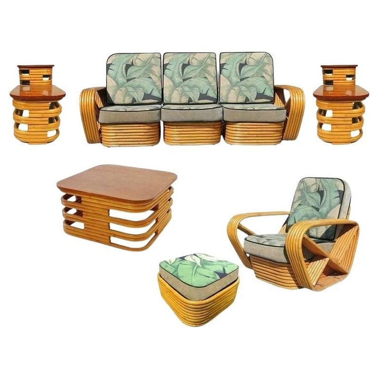 Restored Mid-Century Rattan and Mahogany Living Room Set: Paul Frankl style rattan living room set including a matching three-seat sectional sofa, lounge chair, ottoman, coffee table and pair of end tables. Both the sofa and chair feature the famous six stra