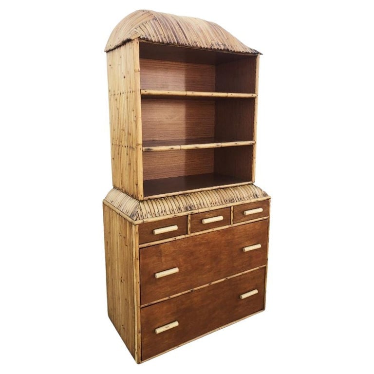 Restored Rare Art Deco Waterfall Rattan & Mahogany Dresser/Bookcase Hutch: This beautifully restored 7-foot tall bespoke Art Deco rattan bookcase/storage blends style with vintage charm and modern comfort with a set of 5 drawers along the bottom with a built-in shelf adornin