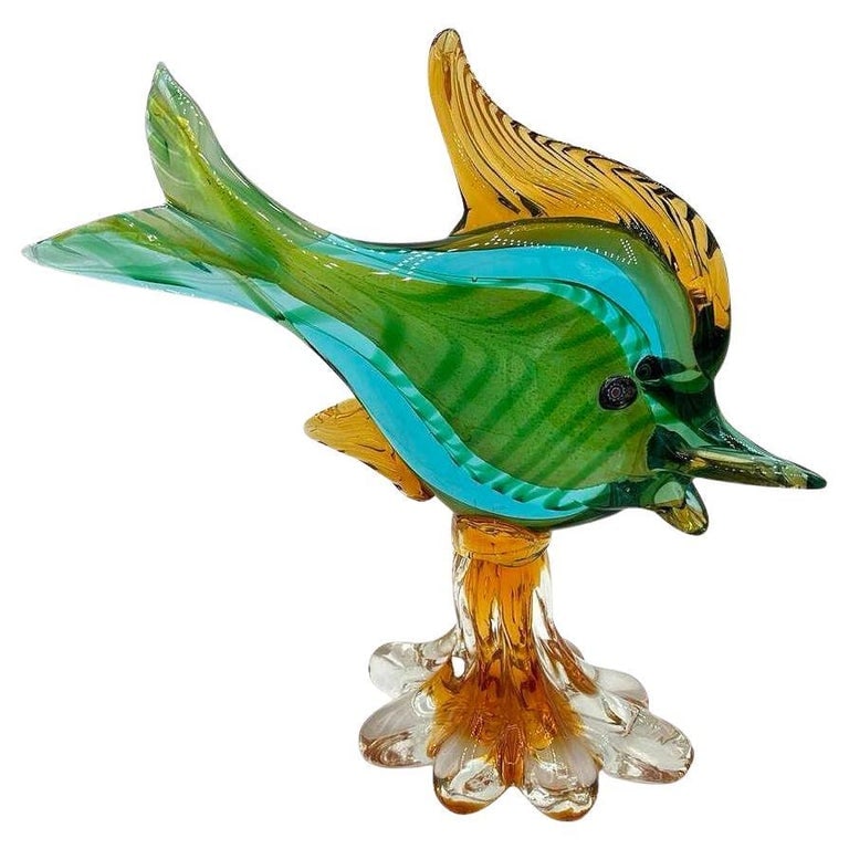 11" Tall Multicolored Venetian Art Glass Angel Fish Sculpture by J.I.Co: Mid-century Murano-style Venetian art glass angel fish sculpture made by J.I.Co. The fishâ€™s body features layers of multicolored glass, expertly crafted using the Sommerso technique