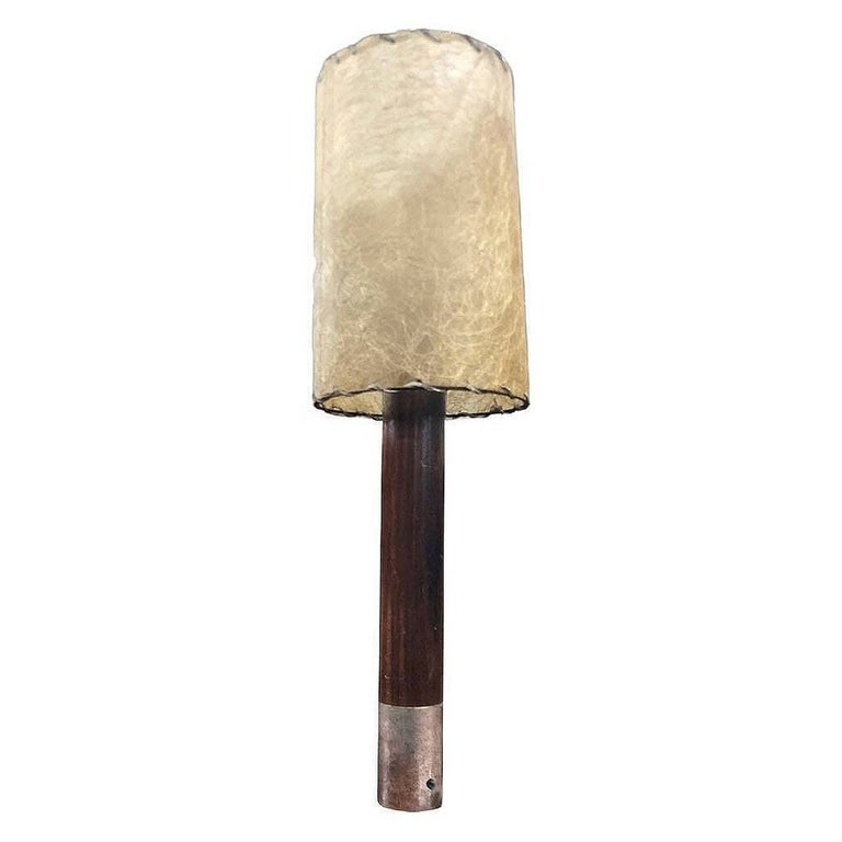 Nickel BÃ¡sica M2 Table Lamp by Santiago Roqueta For Santa & Cole w/ Drum Shade: The Nickel BÃ¡sica M2 table lamp by Santiago Roqueta for Santa & Cole with drum shade. It features a mahogany wood cylinder supported by a sturdy metal base, complemented by an original Whip