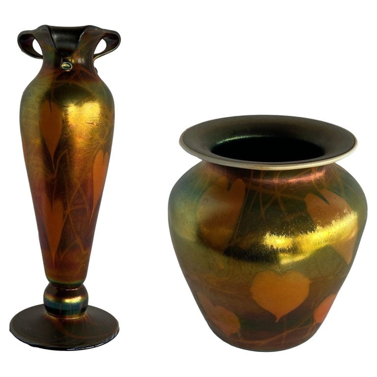 Rare Early 20th Iridescent Handblown Heart & Vine Vase Set by Imperial: The original "Heart & Vine" Vase Set by Imperial showcases the exquisite craftsmanship of Imperial Glass, featuring an iridescent finish that beautifully captures hues of green and red. The vaseâ