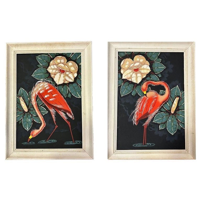 Pair of Mid Century Pink Flamingo Airbrush Prints by Billy SEAY in Frame: A nice set of two airbrush prints of flowers and pink flamingos on a black background by Billy Seay. This a great example of the post-WWII tropical art/decorating boom that took over America in the