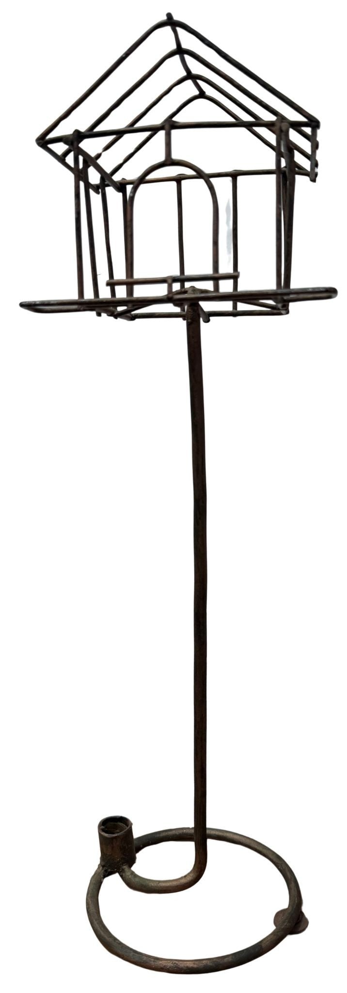 Vintage Wrought Iron Candle Holder: This vintage wrought iron candle holder features a cage design with a long handle and a ring base, presumably to be mounted on a wall bracket or similar fixture. The piece shows significant signs of