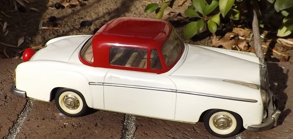 Schuco Rolfix 1080 (Made in Germany 1960), windup through a unique pull cord system, the rarest red - 2