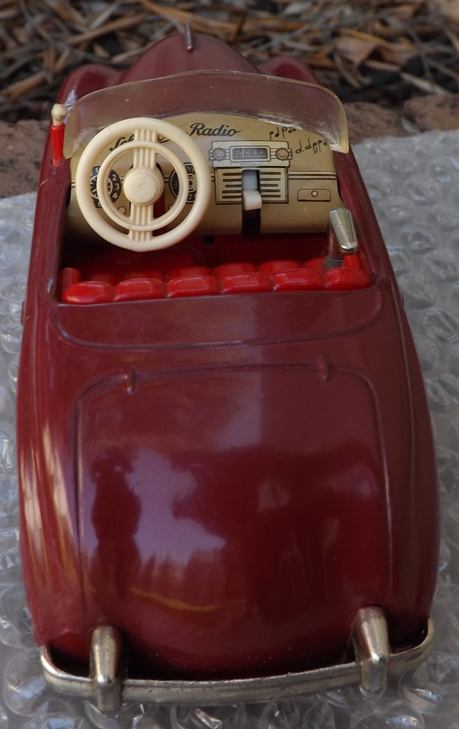 Schuco Radio 4012 (made in US Zone Germany,) two windup motors, one propels the car, the other one - 4
