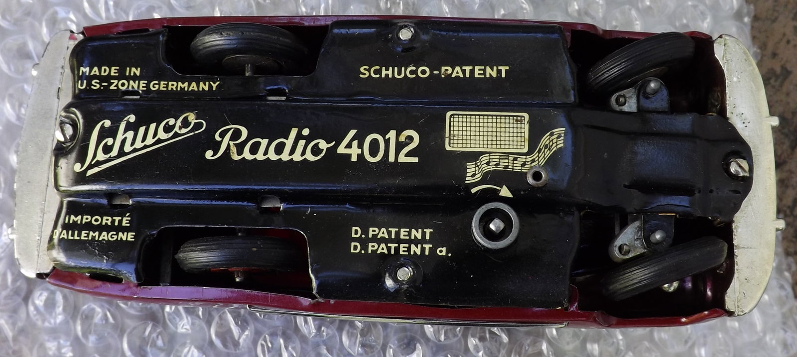 Schuco Radio 4012 (made in US Zone Germany,) two windup motors, one propels the car, the other one - 5