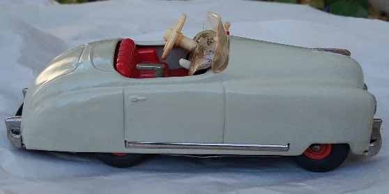 Schuco Radio 4012 (made in US Zone Germany,) two windup motors, one propels the car, the other one - 3