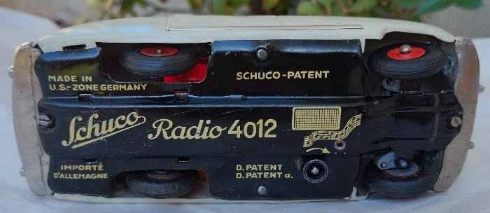 Schuco Radio 4012 (made in US Zone Germany,) two windup motors, one propels the car, the other one - 5