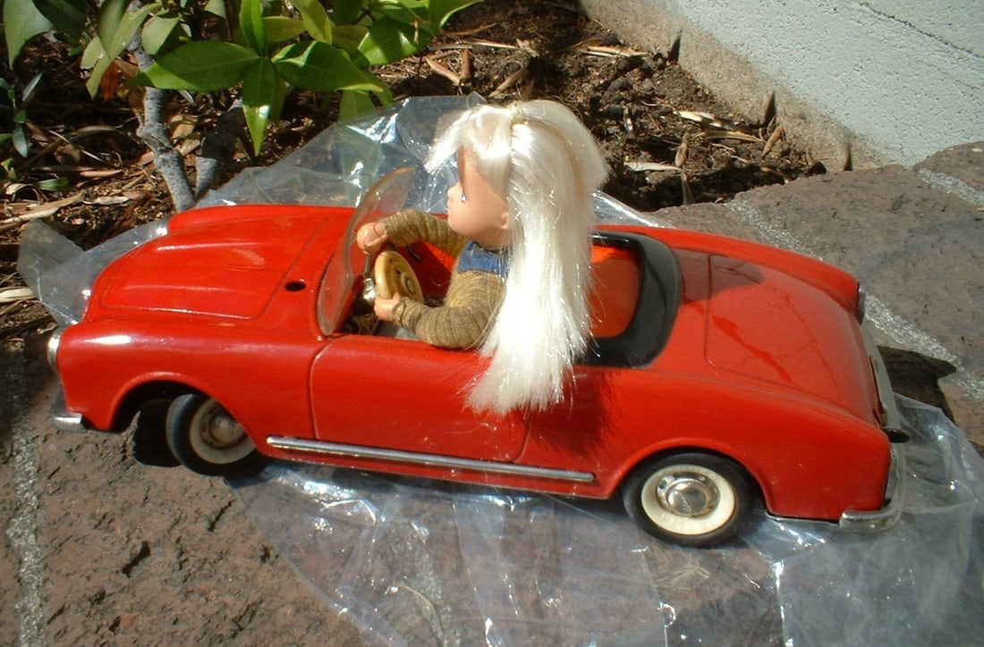 Schuco "Texi" animated doll drives the Italian Alfa Romeo car, a clever program camshaft mechanism - 4