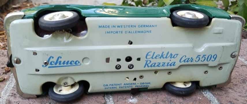 Schuco "Razzia" 5509, Made in Germany, blue light flashes on-off, the policement picks up the - 6
