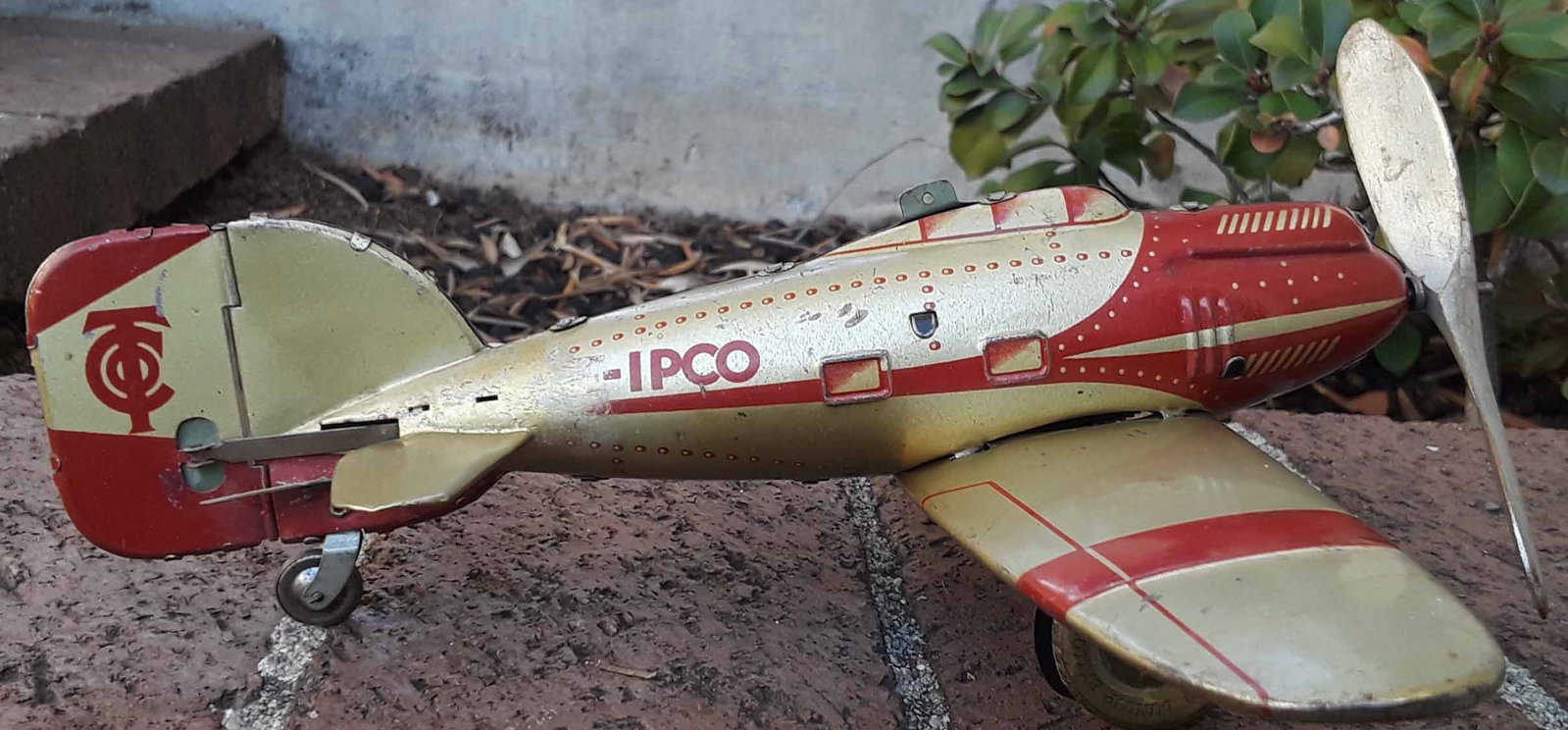 Tippco civilian airplane, the much rarer gold-red combination with moving tail, c8. - 3