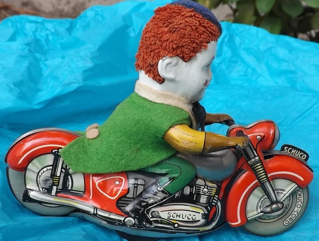 Motorcycle with clown, Schuco 1007, windup , c9. - 2