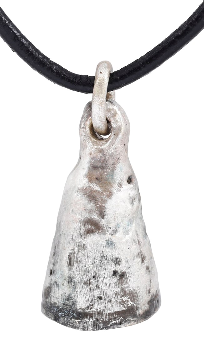 CELTIC VOTIVE BELL NECKLACE 7TH-5TH CENTURY BC: Bronze, just under 1" (0.98”) height, delicately cast with integral suspension loop. Generally acknowledged as exchange objects (money) these frequently are encountered with pieces chipped out. 