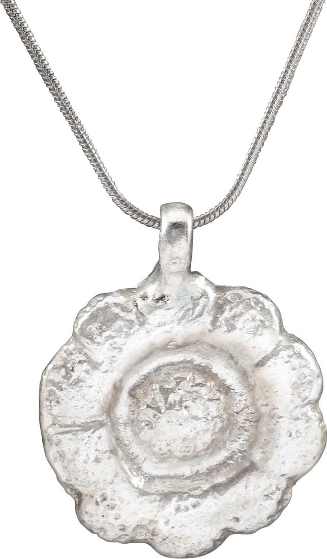 ROMAN WHEEL OF FORTUNE AMULET NECKLACE, 3RD-6TH CENTURY AD: The Wheel of Fortune (Rota Fortuna) is one of the most enduring of ancient philosophical or religious concepts. It was pivotal in Ancient Greek and Roman Paganism and smoothly transitioned into Christ