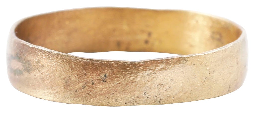 ANCIENT VIKING WEDDING RING, 9TH-1TH CENTURY AD, SIZE 8 1/2: Late 9th-early 11th century AD. Gilt bronze, slightly over size 8 1/2. 4.1mm slightly rounded face. Textured from burial and professionally refurbished with the 24karat gold overlay restored. See the 