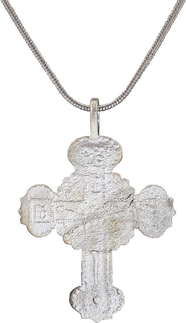 EASTERN EUROPEAN CHRISTIAN CROSS C.1800: Ukrainian. Over 1 ¼” (1.30”) height plus the suspension loop. Trefoil beam terminals with a halo centered. Low relief cross with Corpus Christi. The cross beam with Cyrillic ciphers