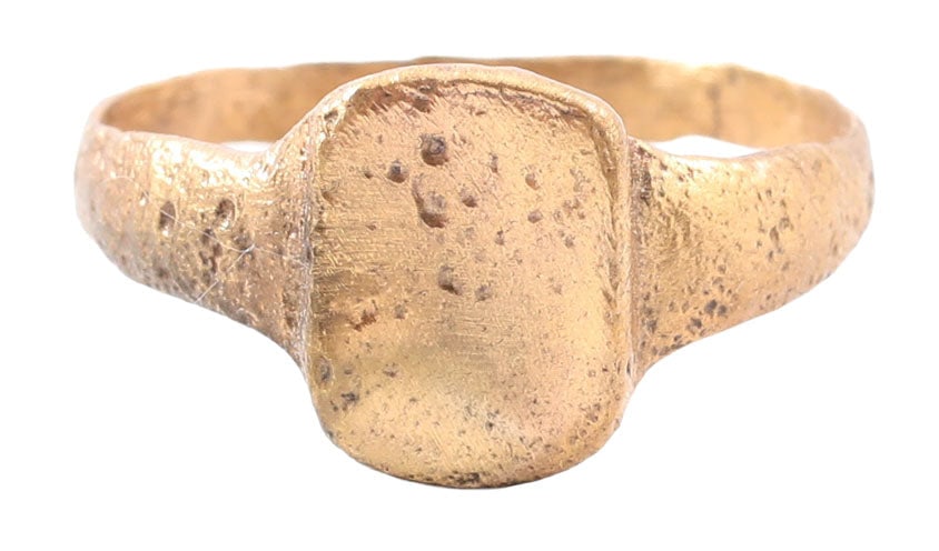 BZNATINE RING 9th-12th CENTURY SIZE 8 3/4: Medieval Europe, 9th-12th century AD. Gilt bronze, size 8 ¾ with 2.4mm rounded face band flaring to the shoulders. Raised transversely orientated lozenge shaped bezel. The top plain, probably ins