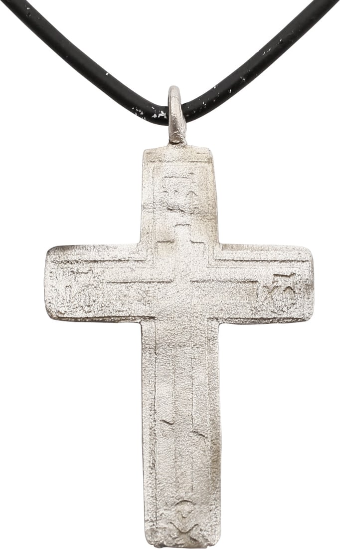 LARGE EASTERN EUROPEAN CROSS NECKLACE, 17th-18th CENTURY: 17th-18th century, Orthodox rite. Silvered bronze, just over 1 1/2" (1.53”) in height plus the suspension loop. Elegant slender beam cross with the cross beam above center, surmounted by a thin 