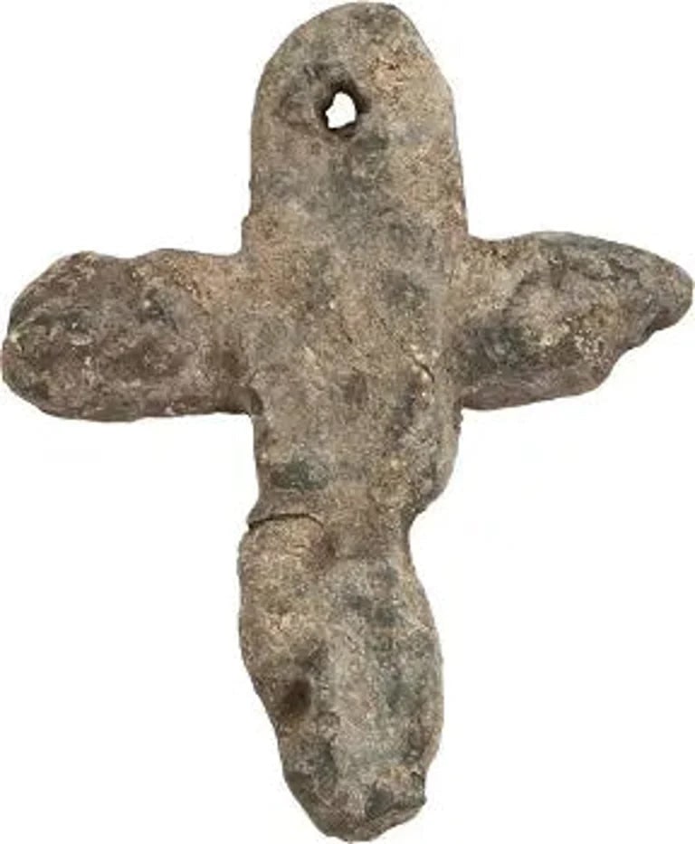 ENGLISH MORTUARY CROSS, 14th CENTURY: Lead, just over 1 1/2" height, with cross beam above center. The top is pierced for a cord to attach to the subject. Hastily made for burial with plague victims of the first great plague of 1348-49. K
