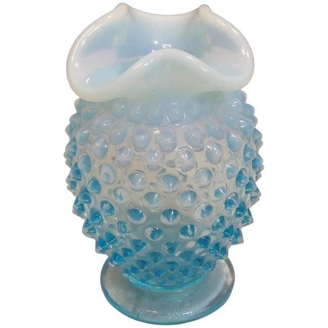 Fenton Blue Hobnail Opalescent Vase: The great thing about this Fenton Blue Hobnail Opalescent Vase is that is fluorescent green under Black Light. It measures 3 3/4" x 2 1/2" No chips, flea bites etc. Shipping: Domestic: Flat-rate of $1
