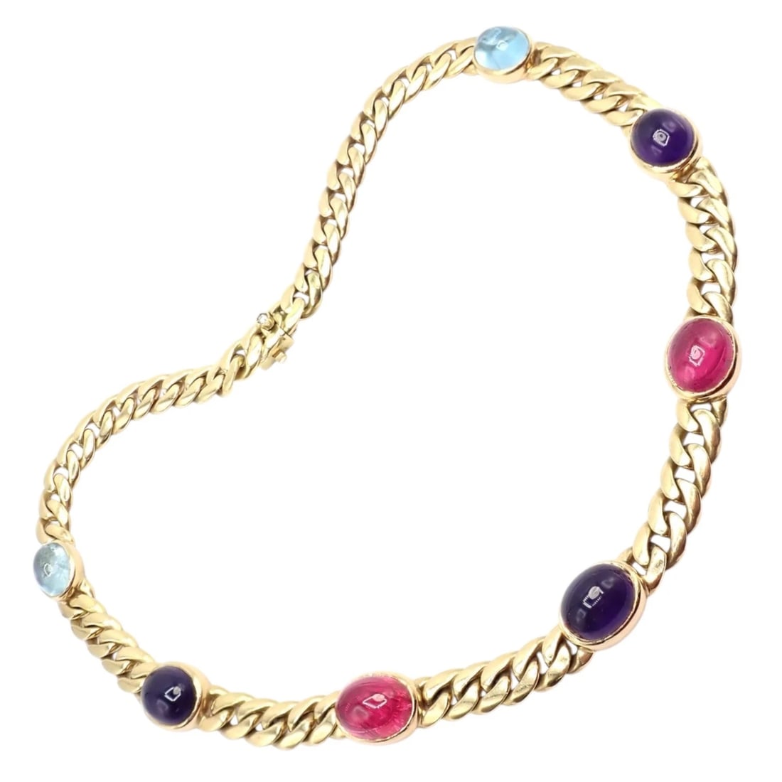 Rare! Vintage Bvlgari Bulgari 18k Yellow Gold Color Stone Link Necklace: This rare vintage Bvlgari necklace is crafted in 18k yellow gold, featuring substantial curb links accented by smooth cabochon gemstones in vibrant blue, purple, and pink hues. Bold yet