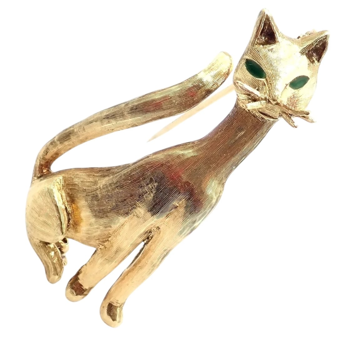 Authentic! Tiffany & Co 18k Yellow Gold Emerald Cat Pin Brooch: This authentic Tiffany & Co. cat brooch is crafted in 18k yellow gold, featuring a sleek sculptural feline form with textured gold detailing and vivid emerald eyes. The elongated pose and curved tail