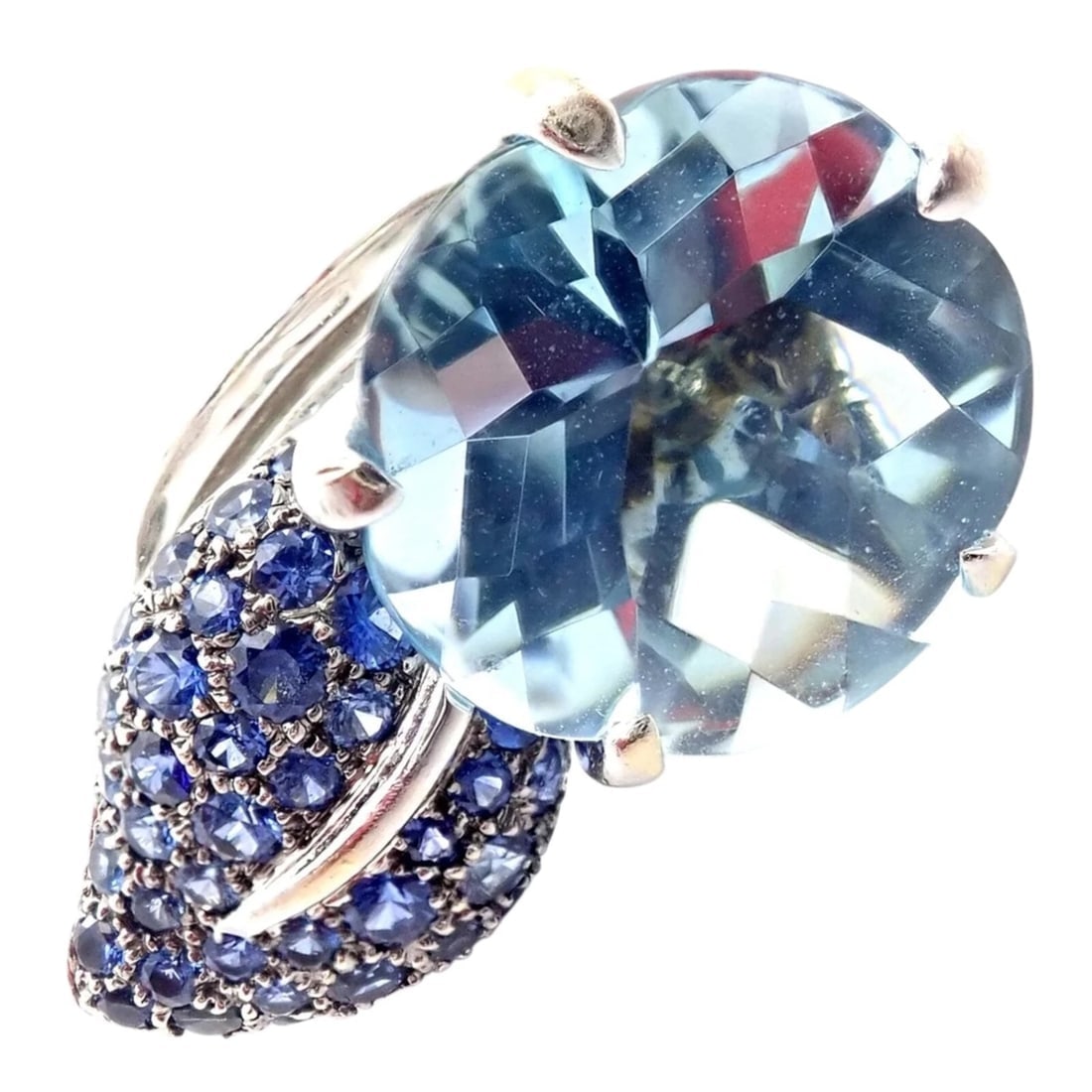 Authentic! Chanel Camellia Flower 18k White Gold Aquamarine Sapphire Ring: Authentic! Chanel Camellia Flower 18k White Gold Aquamarine Sapphire Ring About This Piece: The Chanel Camellia Flower Ring is a luxurious piece crafted in 18k white gold. It features a 15mm round