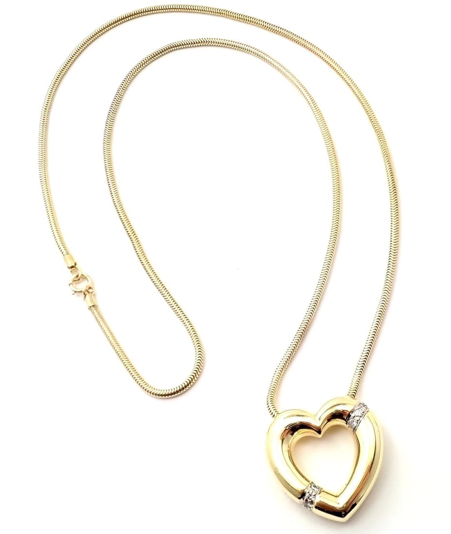 Authentic! Tiffany & Co Picasso 18k Yellow Gold Diamond Heart Pendant Necklace: Authentic! Tiffany & Co Picasso 18k Yellow Gold Diamond Heart Pendant Necklace About This Piece: Metal: 18k Yellow Gold Measurements: Length: 19" Width: 2mm Weight: Pendant: 21.3 grams 23mm x 22mm Sto