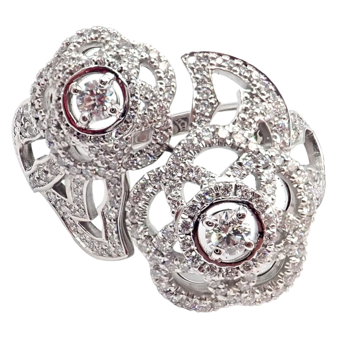 Authentic! Chanel Camellia Two Flower 18k White Gold Diamond Ring: Authentic! Chanel Camellia Two Flower 18k White Gold Diamond Ring About This Piece: The Chanel Camellia Two Flower Ring is crafted from 18k white gold and features two camellia flowers, each adorned