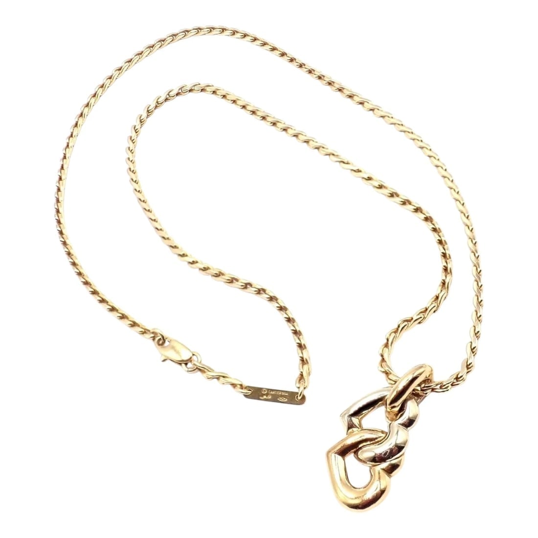 Authentic! Cartier 18k Yellow White Gold Double Heart Pendant Chain Necklace: Authentic! Cartier 18k Yellow White Gold Double Heart Pendant Chain Necklace About This Piece: Bask in timeless elegance with Cartier’s 18k Yellow and White Gold Double Heart Pendant Chain