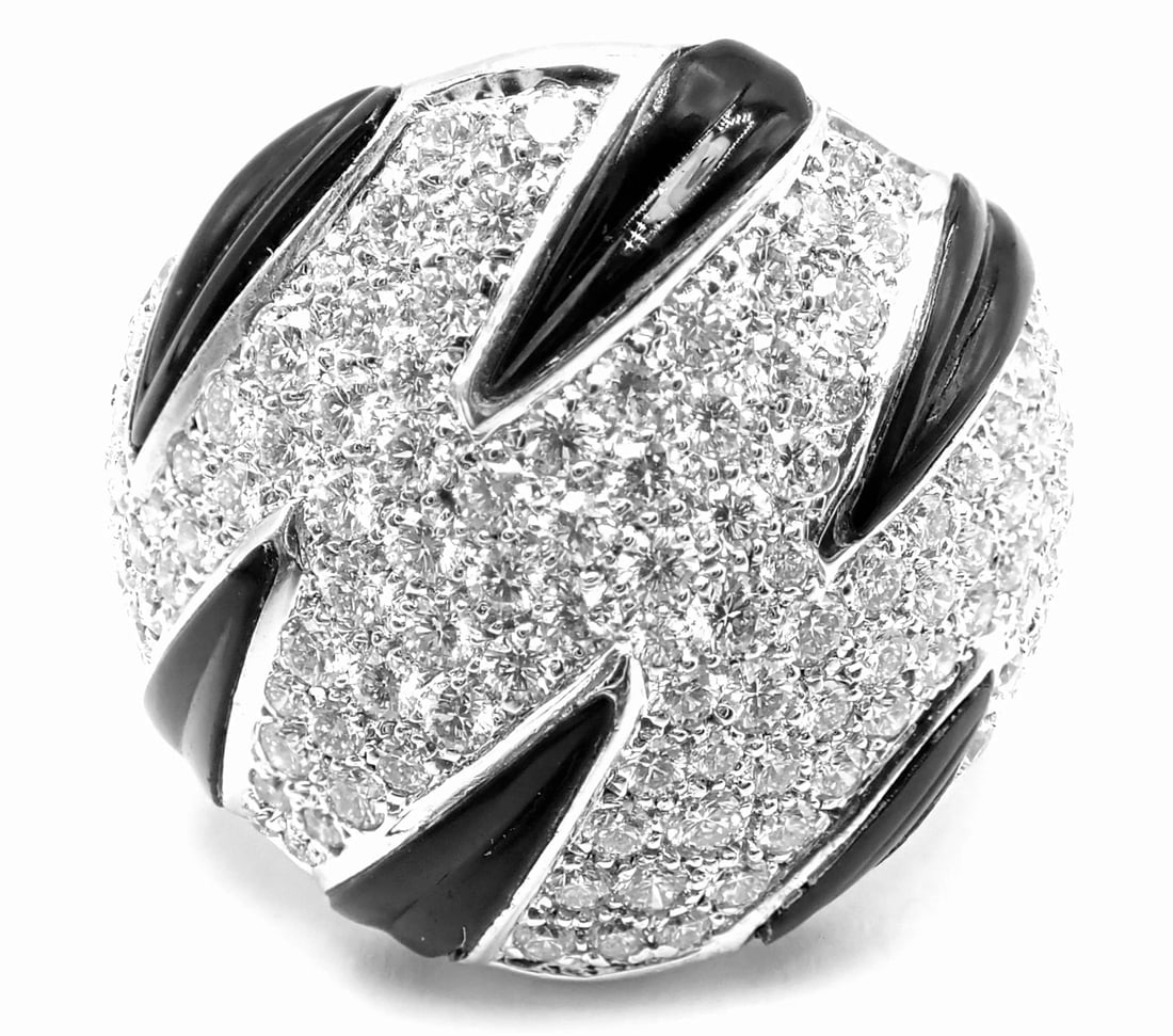 Authentic Cartier Panther Panthere Claw 18k White Gold Diamond Onyx Ring Size 53: Authentic Cartier Panther Panthere Claw 18k White Gold Diamond Onyx Ring Size 53 About This Piece: Metal: 18k White Gold Measurements: Width: 20mm Weight: 11.3 grams Stones: 145 Round brilliant cut
