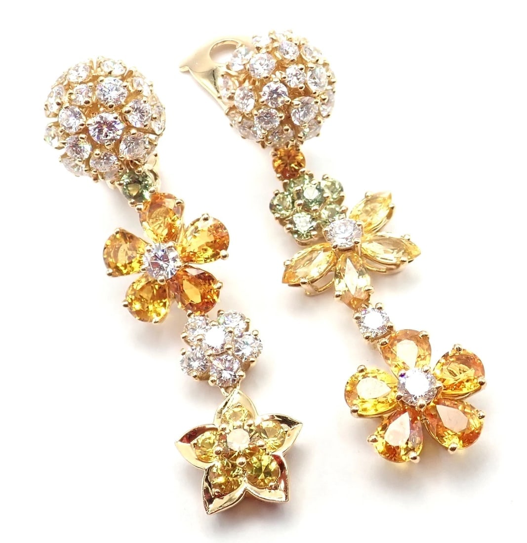 Authentic! Van Cleef & Arpels Folie des Pres 18k Gold Diamond Sapphire Earrings: Authentic! Van Cleef & Arpels Folie des Pres 18k Gold Diamond Sapphire Earrings About This Piece: About VCA: In 1896, Esther Arpels, the daughter of Salomon Arpels, a dealer in precious stones, marrie