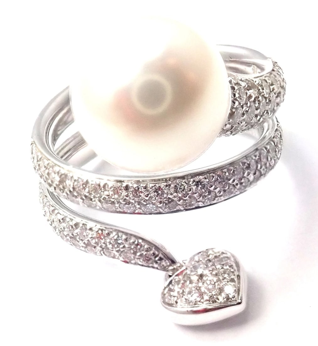 Rare! Authentic Mikimoto 18k White Gold Diamond South Sea Pearl Heart Ring Cert.: Rare! Authentic Mikimoto 18k White Gold Diamond South Sea Pearl Heart Ring Cert. About This Piece: Metal: 18k White Gold Size: 6 3/4 Stones: Round brilliant cut VS1 clarity, E color diamonds total