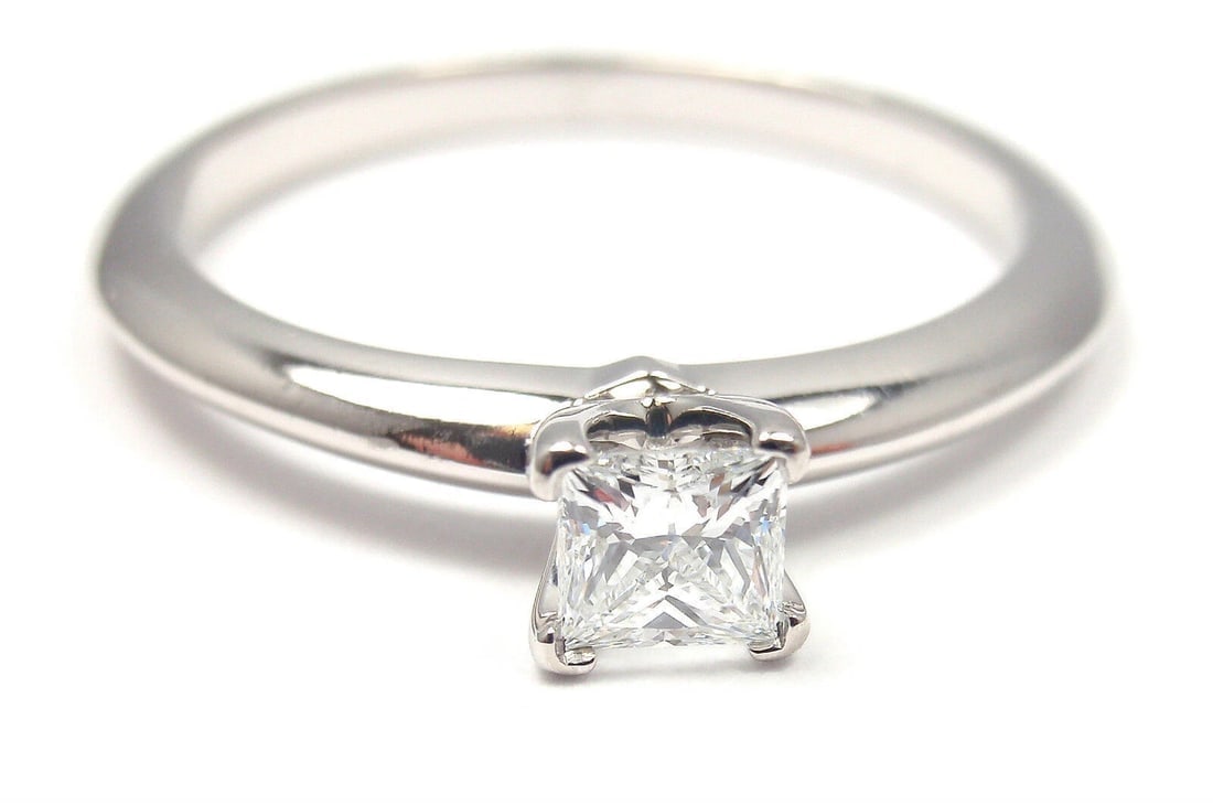 TIFFANY & CO PLATINUM SQUARE CUT DIAMOND 0.22CT VS2 D TRIPLE X ENGAGEMENT RING: TIFFANY & CO PLATINUM SQUARE CUT DIAMOND 0.22CT VS2 D TRIPLE X ENGAGEMENT RING About This Piece: Crown Inscription: T&Co K11050286 Metal: Diamonds: Platinum 950 Square Cut 0.22 ct. Clarity: VS2