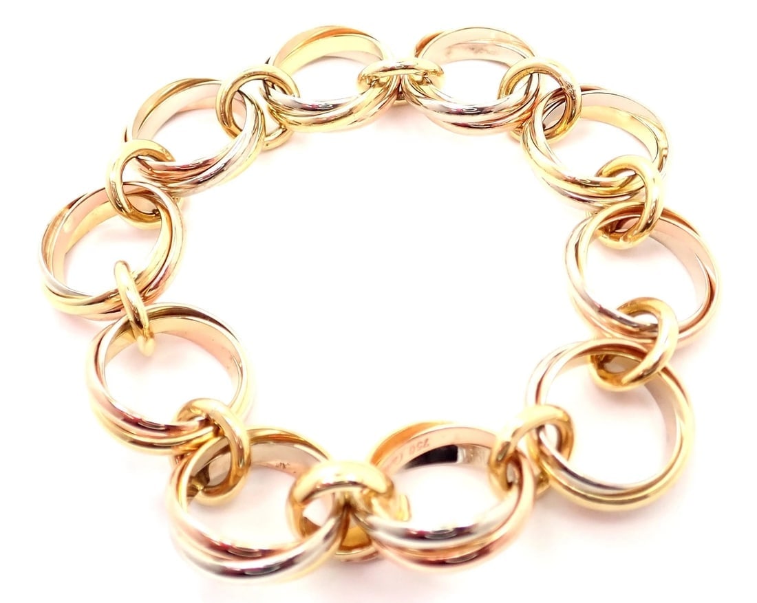 Authentic! Cartier Trinity 18k Multi Color Gold Round Wide Link Bracelet: Authentic! Cartier Trinity 18k Multi Color Gold Round Wide Link Bracelet About This Piece: About Cartier: The company has a long and distinguished history of serving royalty, as well as stars and