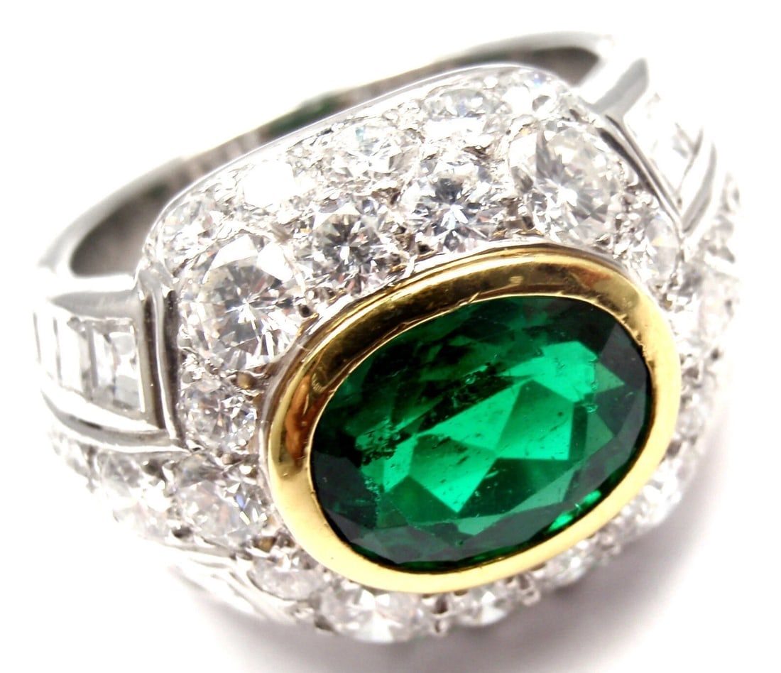 Rare! Authentic Patek Philippe Platinum Diamond Emerald Ring Certificate: Rare! Authentic Patek Philippe Platinum Diamond Emerald Ring Certificate About This Piece: This ring is AGL certified. Origin: Zambia. Metal: Platinum Size: 6 Measurements: Weight: 16.2 grams Width: