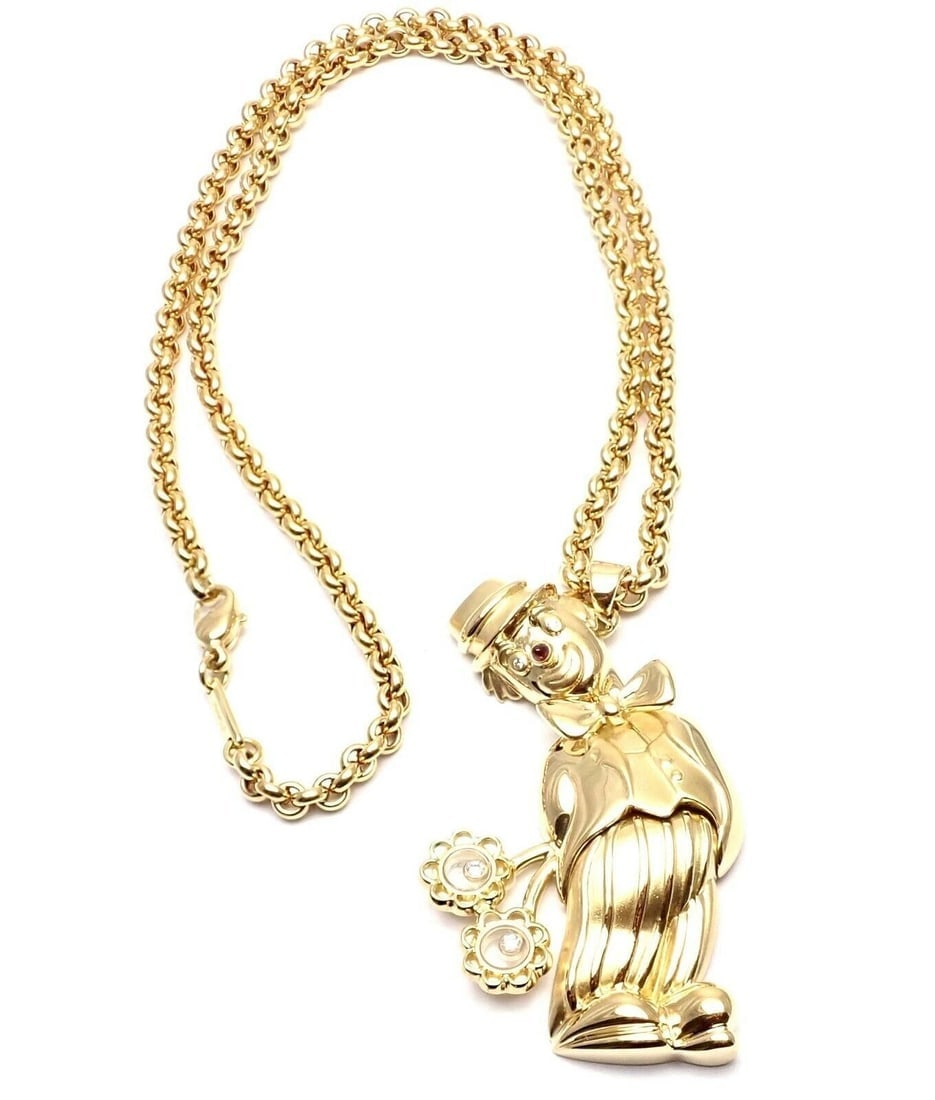 Authentic! Chopard 18k Yellow Gold Large Happy Clown Flower Pendant Necklace: Authentic! Chopard 18k Yellow Gold Large Happy Clown Flower Pendant Necklace About This Piece: Metal: 18k Yellow Gold Measurements: Length: 20" Width: 4mm Pendant: 2.5" x 1.5" Weight: 62.7 grams