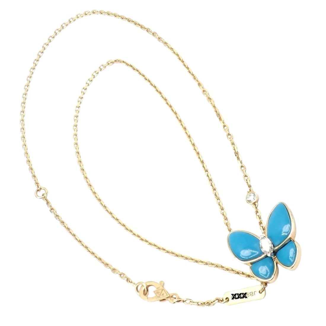 Van Cleef & Arpels 18k Gold Diamond Turquoise Butterfly Pendant Necklace Cert.: Van Cleef & Arpels 18k gold butterfly pendant necklace featuring vivid turquoise wings and a sparkling diamond body. A delicate chain and bezel-set accent diamond enhance its graceful, airy charm. Exq