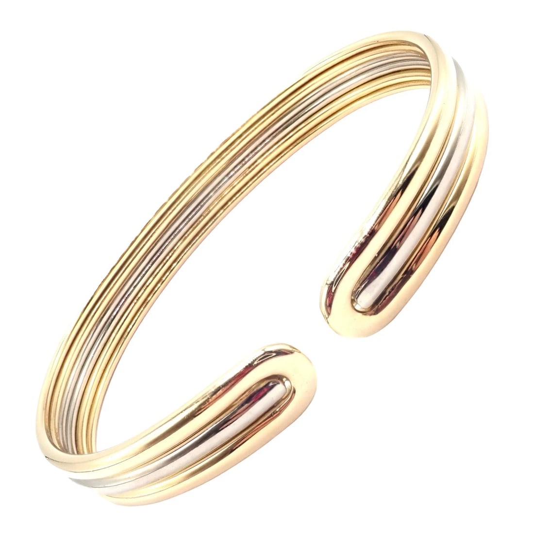 Authentic! Van Cleef & Arpels 18k Yellow & White Gold Bangle Cuff Bracelet Paper: The Van Cleef & Arpels bangle cuff bracelet is an epitome of sophistication, crafted from 18k yellow and white gold. This elegant piece showcases a timeless design, blending two hues of gold for a