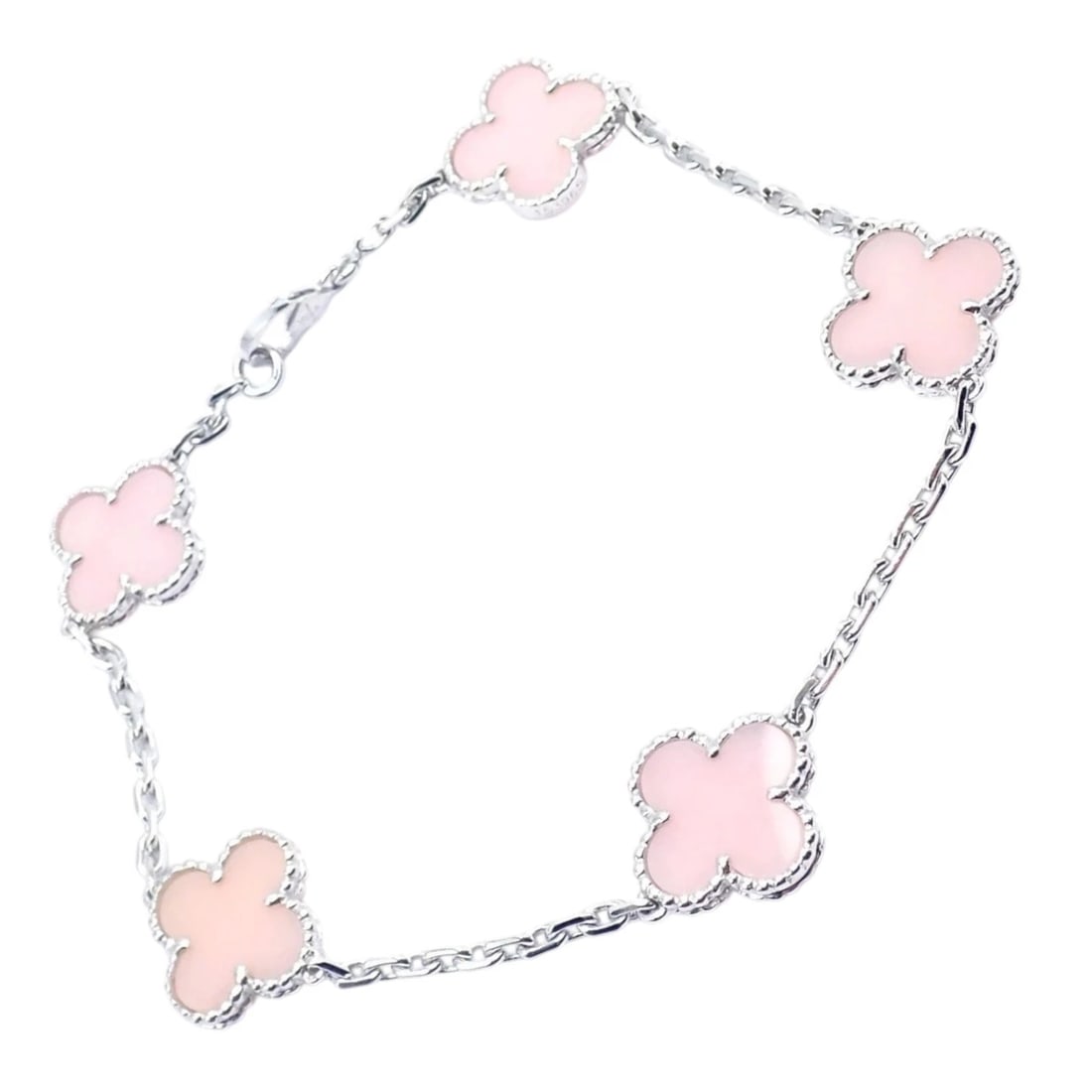 Authentic! Van Cleef & Arpels Alhambra 18k White Gold Pink Opal Bracelet Cer.: Van Cleef & Arpels Alhambra bracelet in 18k white gold featuring five soft pink opal motifs framed by delicate beaded edges. Feminine, elegant, and luminous, it embodies the iconic Alhambra symbolism 